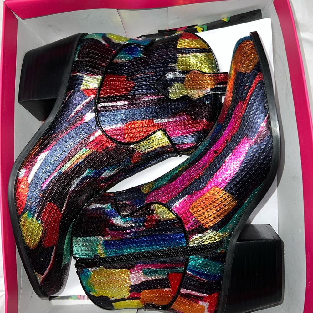 Women’s size 9 multi color boot. Betsy Johnson, New with box. Never worn